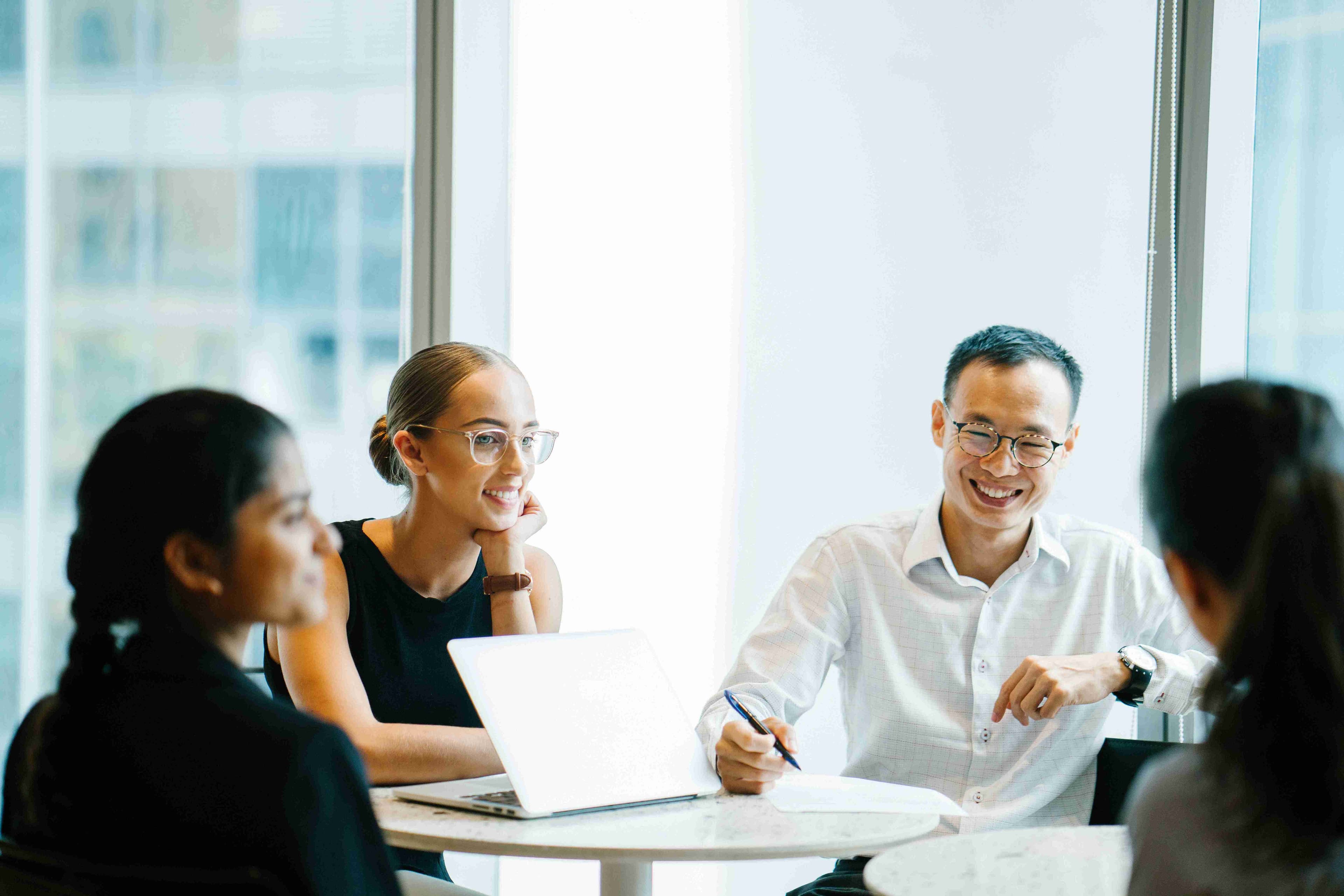 Group of young adults working