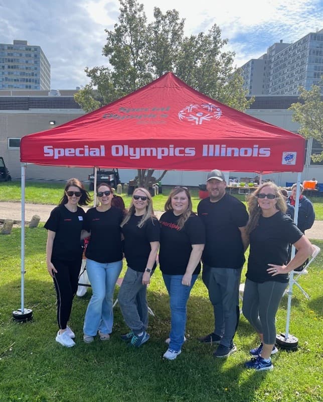 colleagues gathering for a photo
