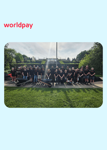 colleagues taking a group photo outside