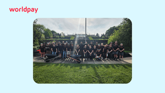 colleagues taking a group photo outside