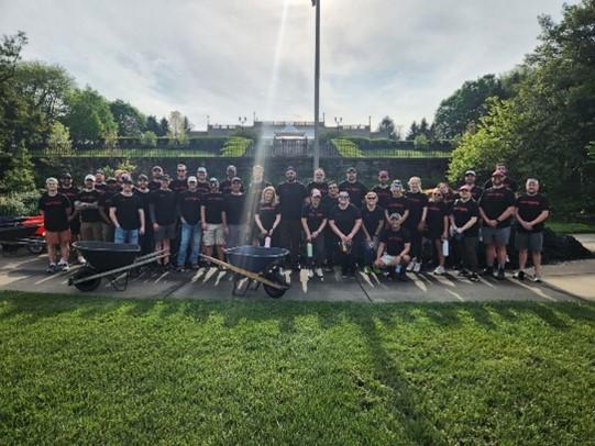 colleagues taking a group photo outside