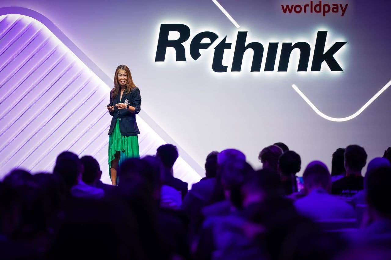 female presenting on stage