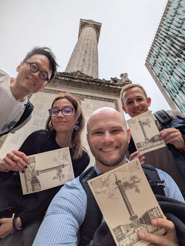 group of people at monument