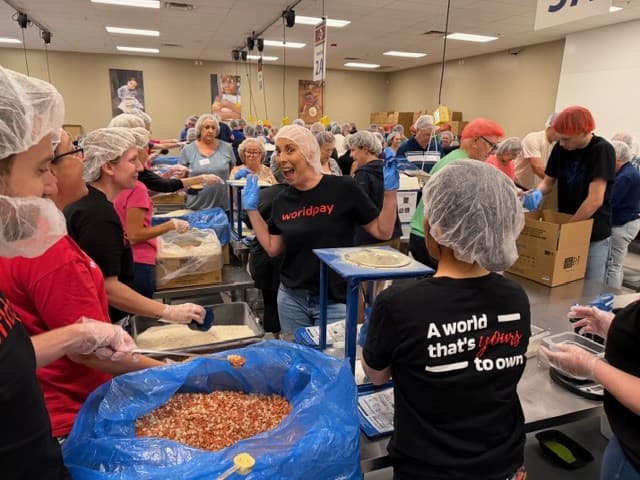 group of people packaging items