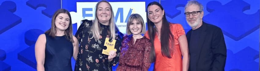 group of people winning an award